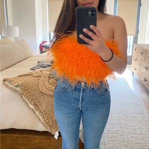 Feathered orange top